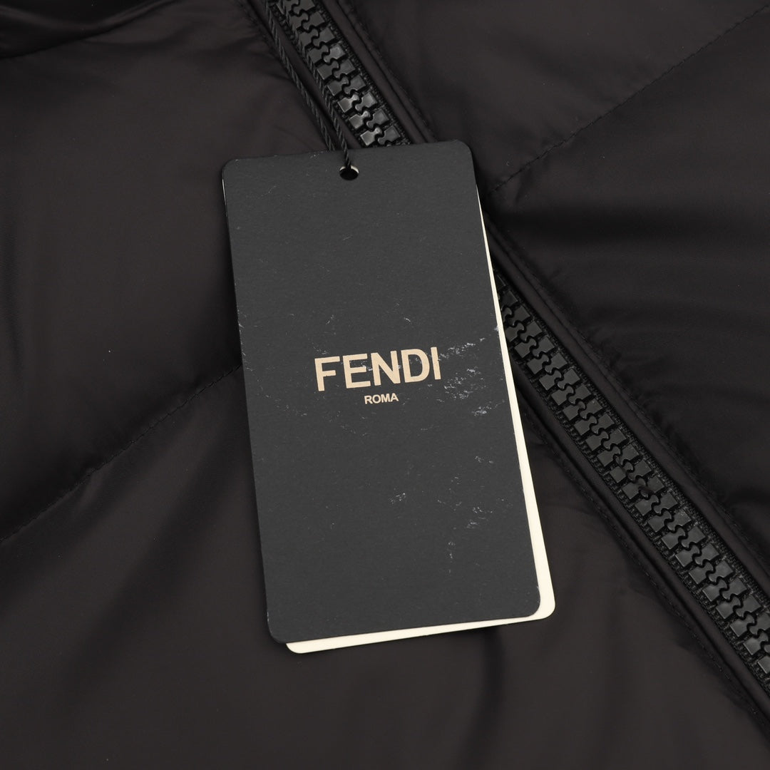 Black puffer jacket zipper with hanging FENDI tag