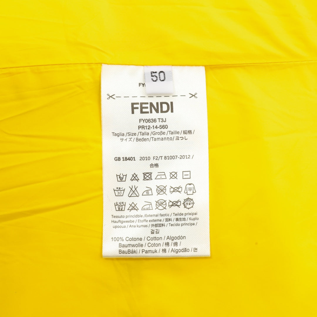 Jacket care label showing FENDI branding and size info on yellow interior fabric