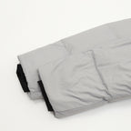 Puffer jacket hem and back panel, light gray quilted fabric with black lining