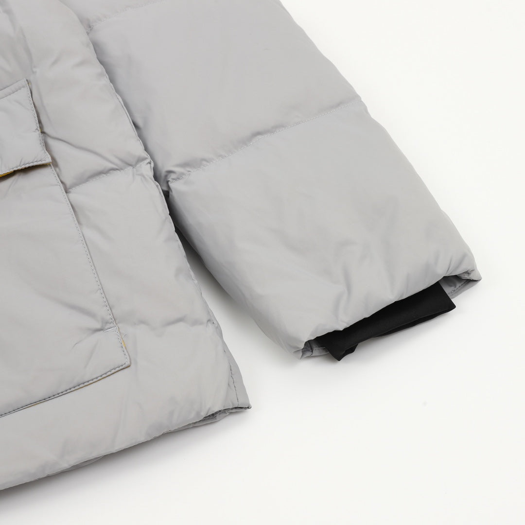 Puffer jacket sleeve and cuff with quilted seams, gray and black inner trim