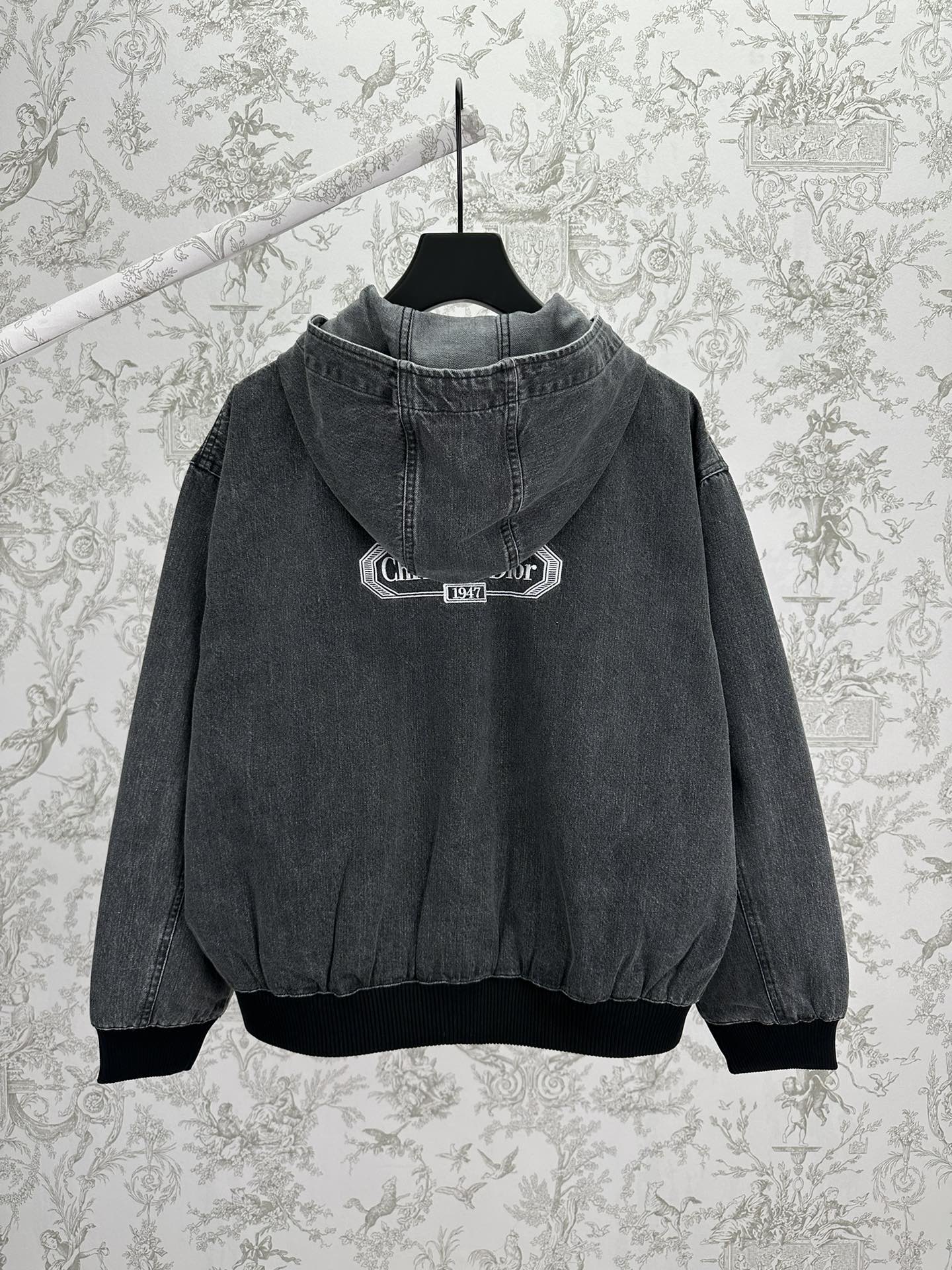 Dior hooded denim jacket, back view with logo label on the hood