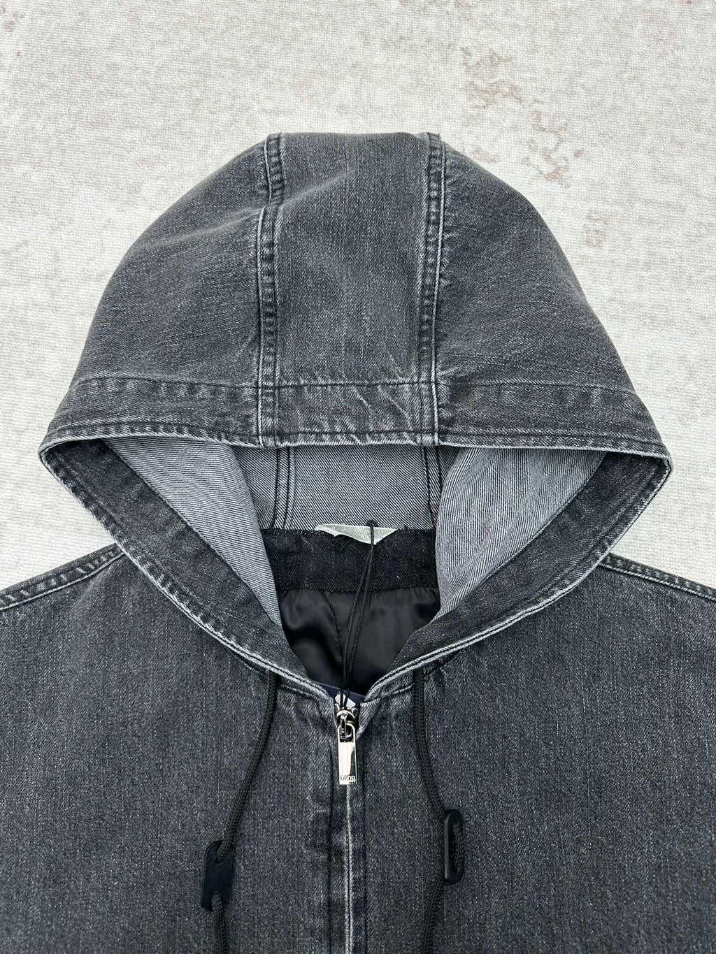 Dior denim hood with adjustable drawstring and black interior lining