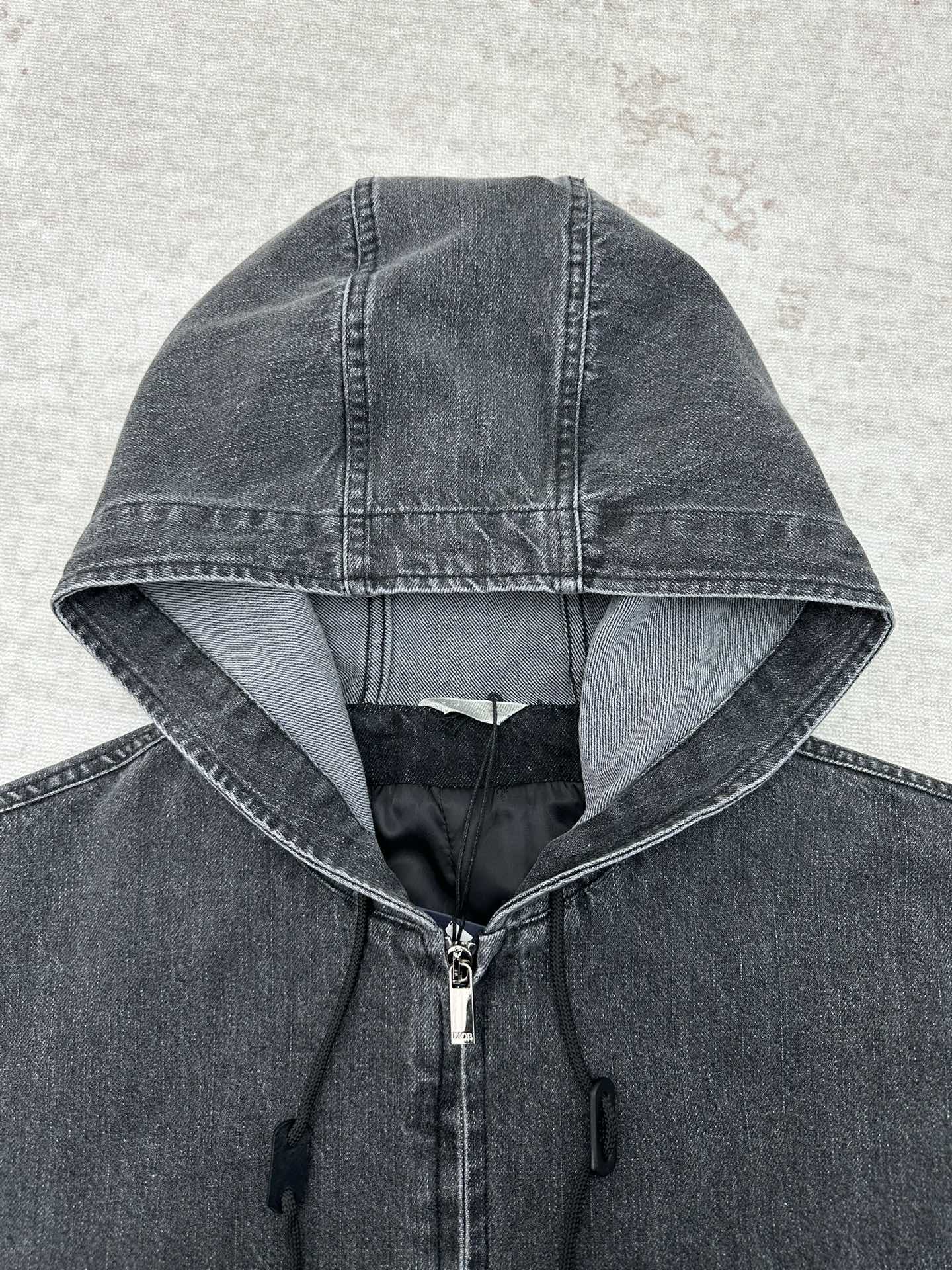 Dior denim hood with adjustable drawstring and black interior lining