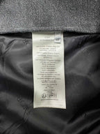 Dior denim jacket inside care label and fabric composition tag