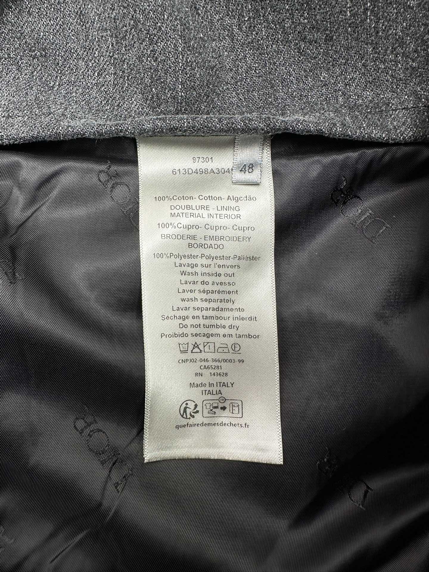 Dior denim jacket inside care label and fabric composition tag