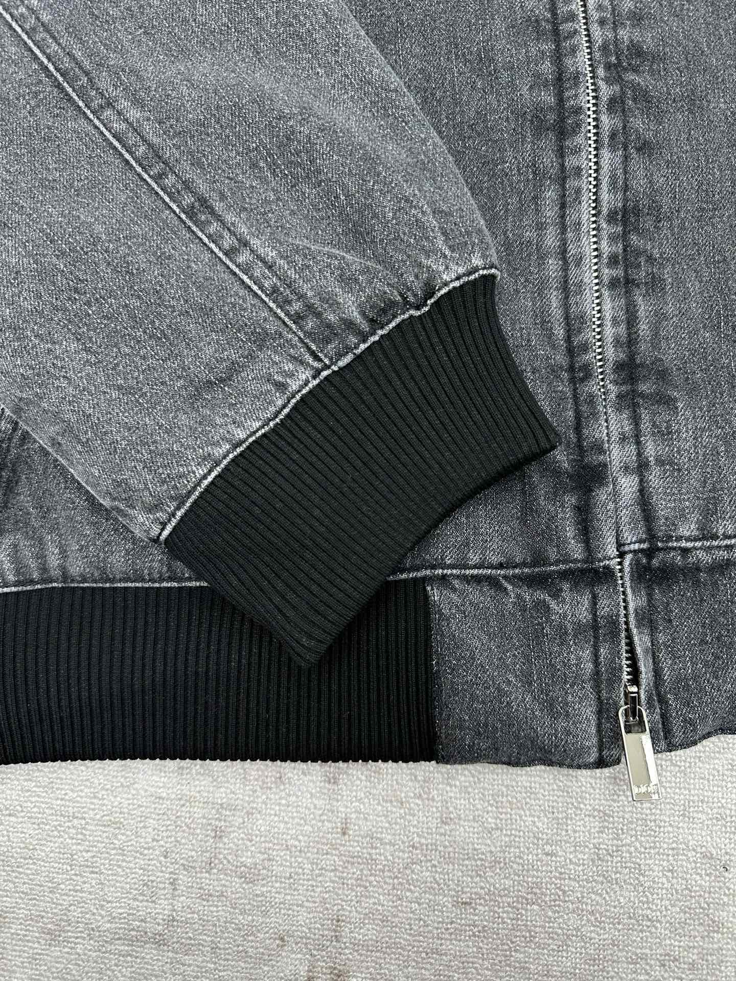 Dior denim jacket cuff with ribbed knit trim and zipper detail