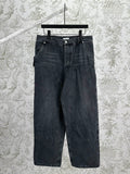 Dark blue denim pants with belt loops, front button, and straight-leg fit