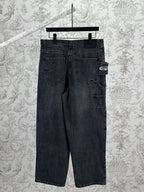 Dark blue denim pants with back yoke, patch pockets, and belt-loop waistband