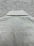 Long white jacket back with yoke seam and hidden button placket