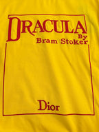 Yellow short-sleeve T-shirt front panel with red 'DRACULA' and 'Dior' print