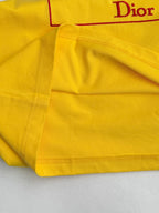 Yellow T-shirt hem and side seam stitching with Dior print