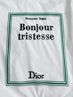 White Dior T-shirt front graphic: Bonjour tristesse with green border