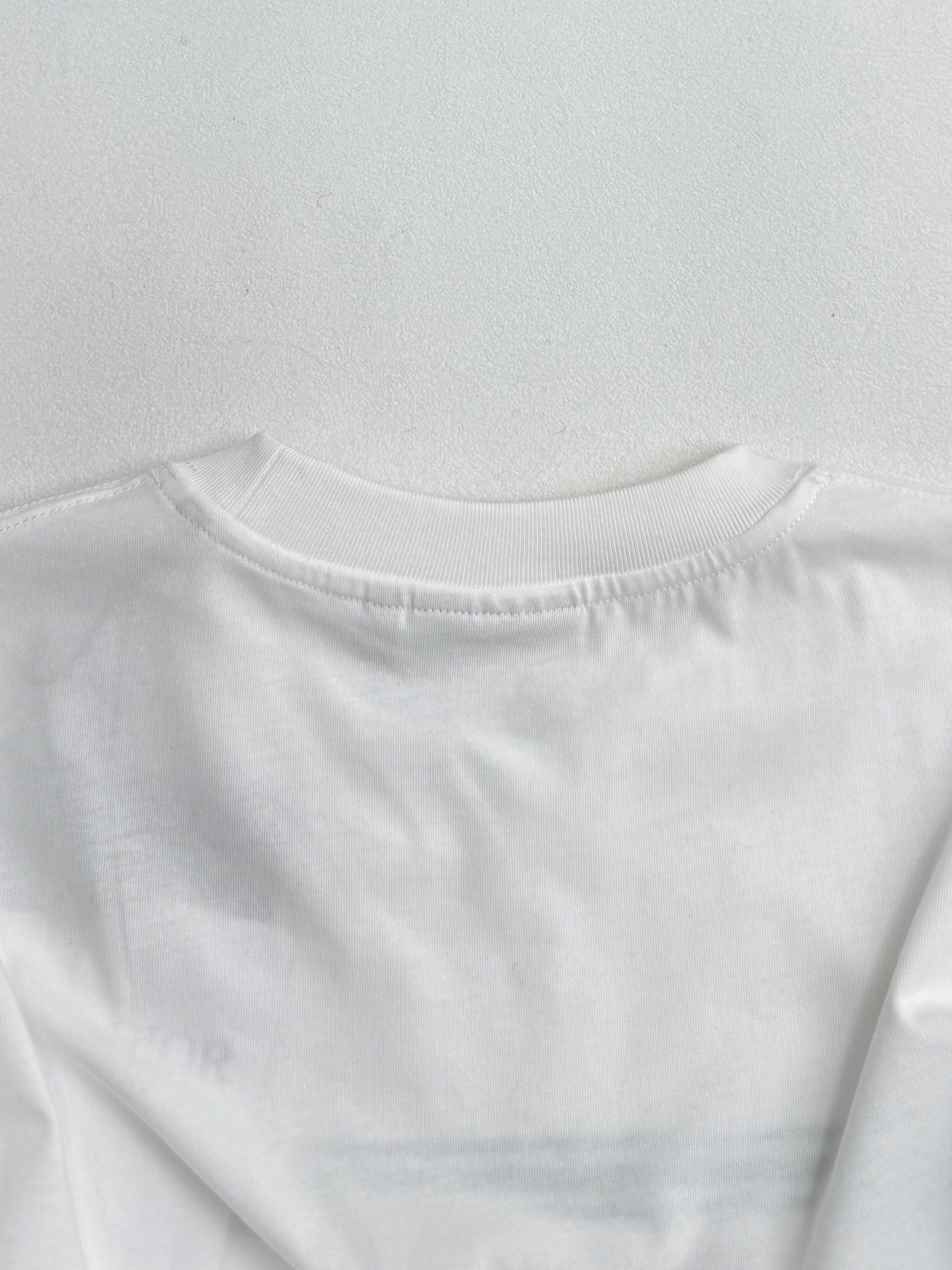 White Dior T-shirt back neckline with seam detail