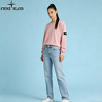 Stone Island pink crewneck sweatshirt with light-blue jeans