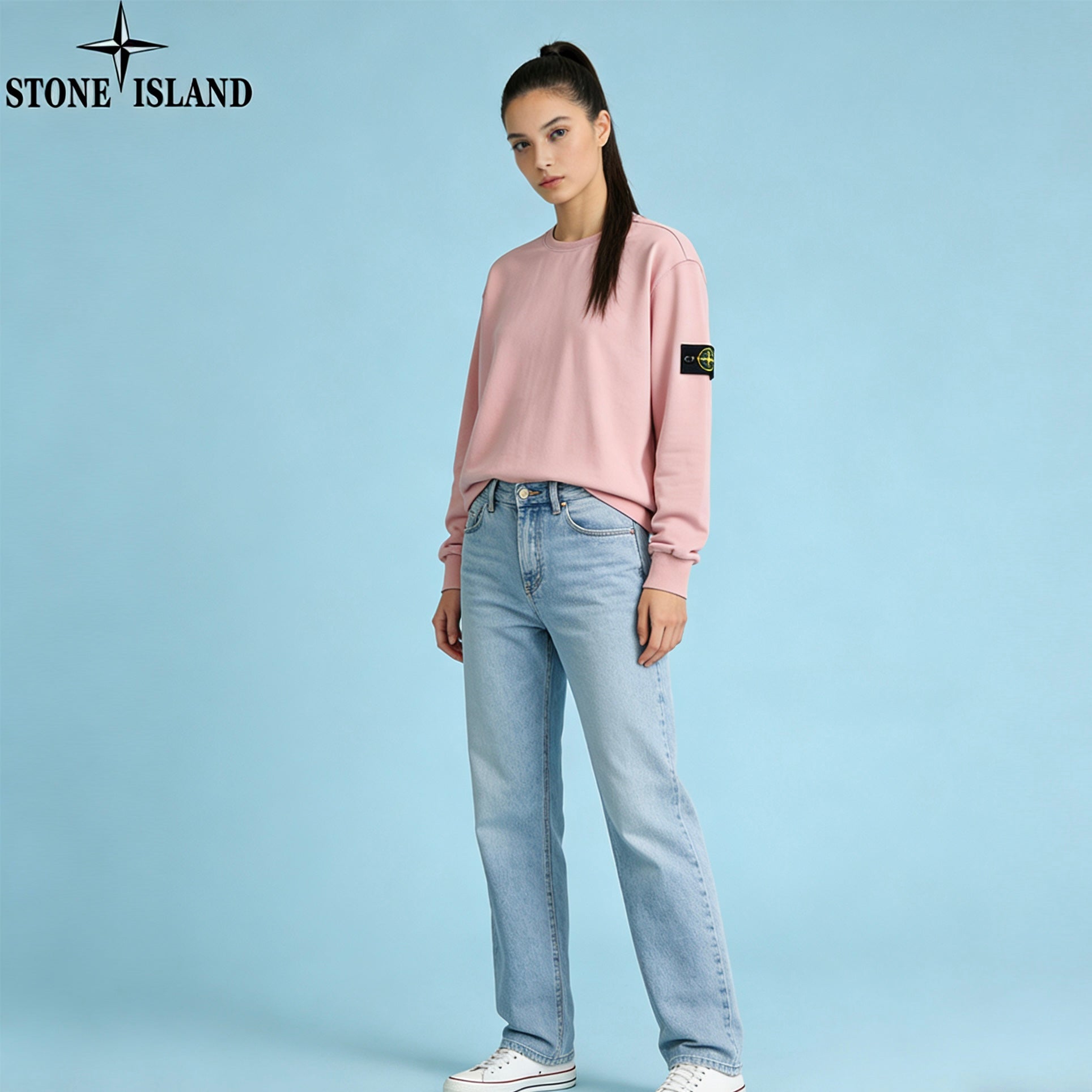 Stone Island pink crewneck sweatshirt with light-blue jeans