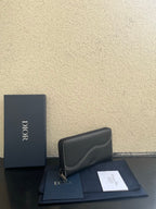 Dior small zip wallet bag in dark leather, front panel seam, gold zipper pull