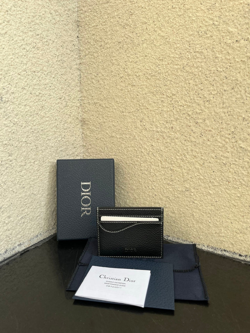 Dior small card holder in dark textured leather, stitched edge and logo panel