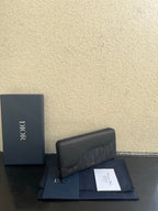 Small Dior clutch-style bag with monogram canvas front flap and zipper