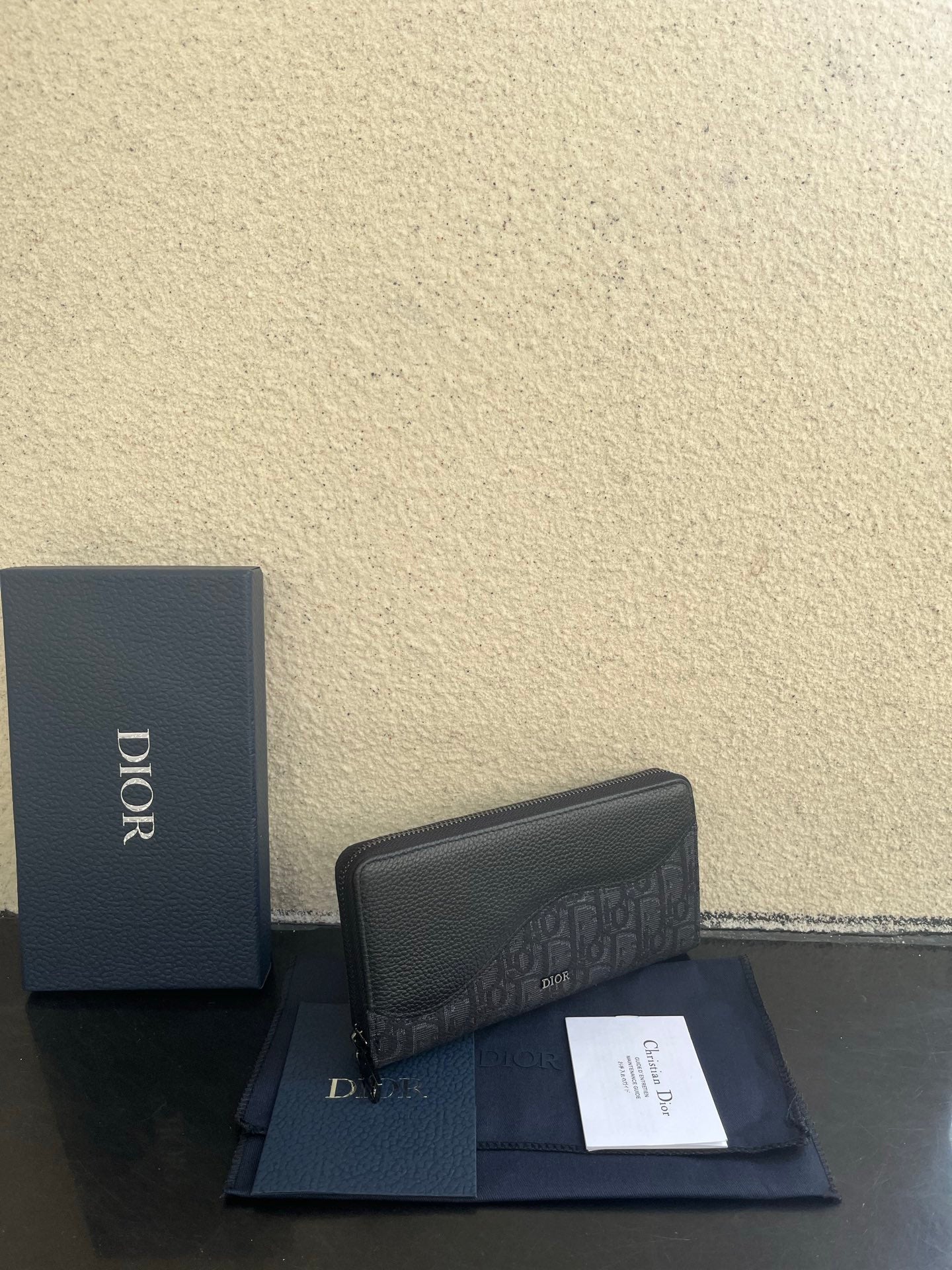 Small Dior clutch-style bag with monogram canvas front flap and zipper