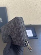 Small Dior zip pouch bag with monogram canvas, silver zipper pull