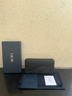 Small Dior bag with monogram canvas front flap and top zipper closure