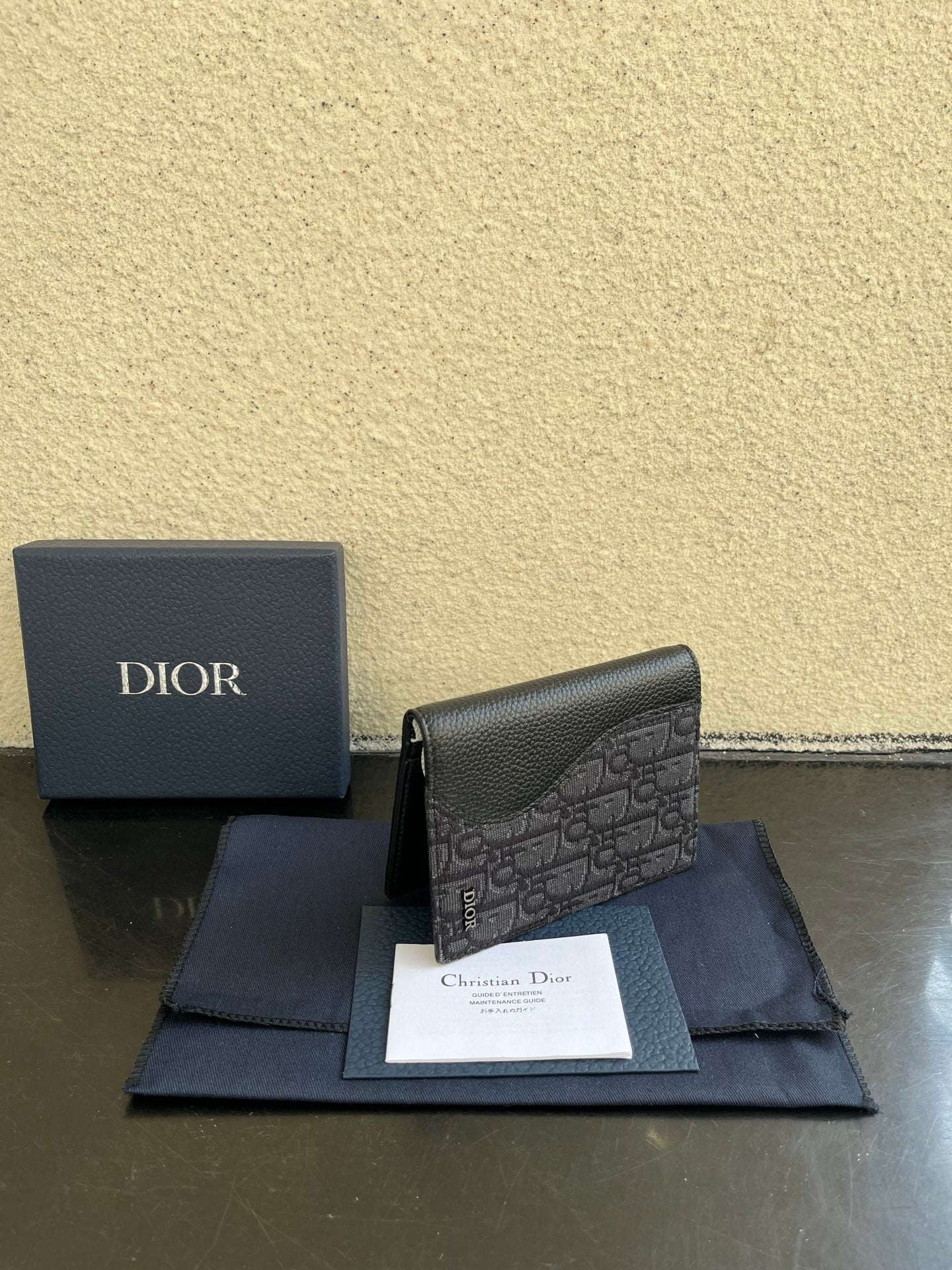 Dior small bag with gray Dior monogram fabric and textured leather trim