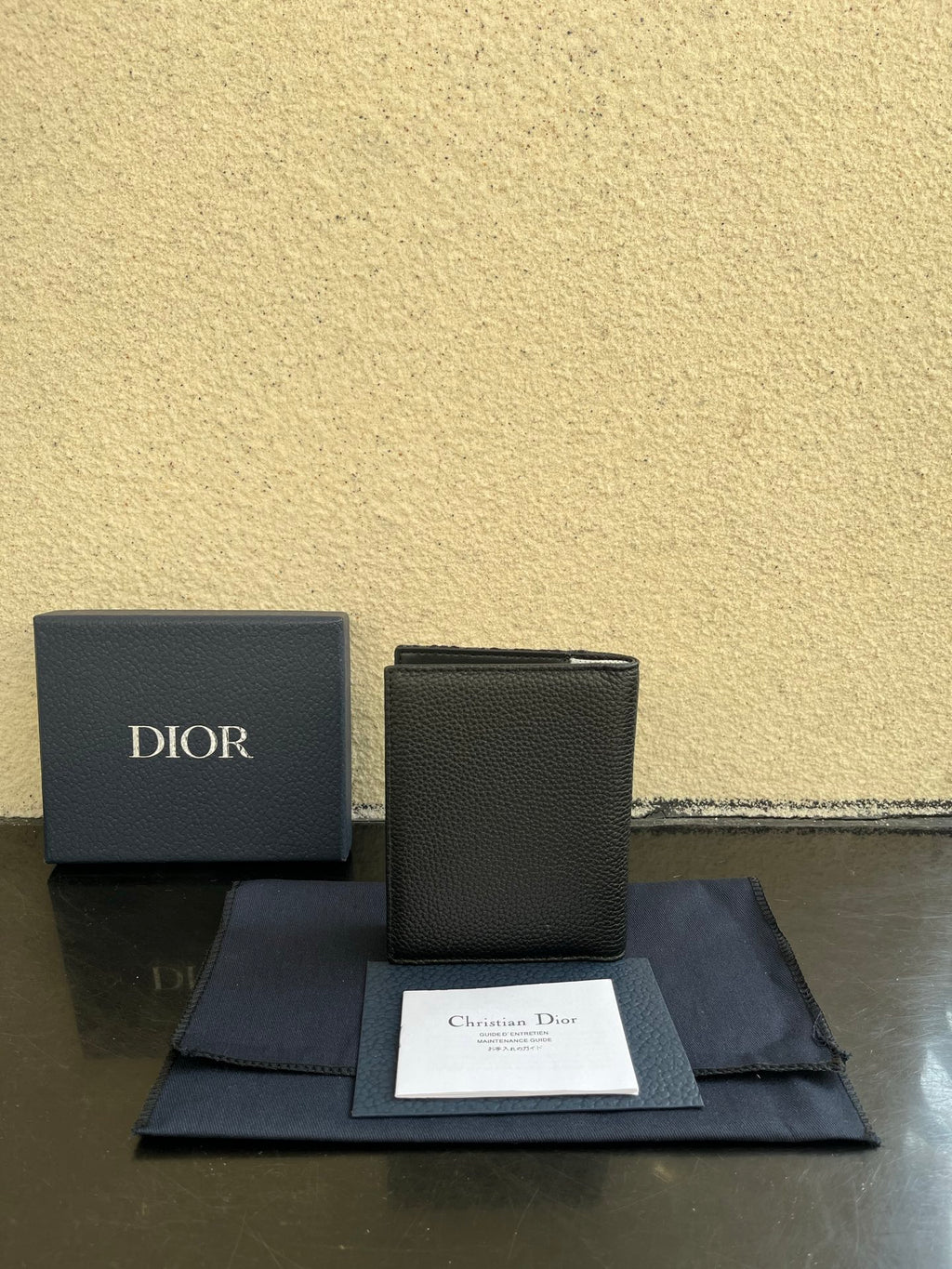 Dior small bag in dark grained leather with front flap