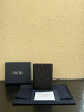 Dior small bag in dark grained leather with monogram front panel