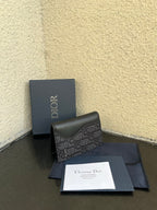 Dior small bag with patterned leather front and dark box, with papers and sleeve