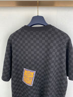 Black check short-sleeve T-shirt back view with embroidered square patch