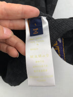 Louis Vuitton shorts care label with Made in Italy on white tag
