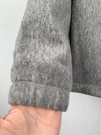 Gray long-sleeve jacket sleeve cuff with stitched hem