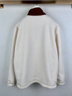 Cream fleece quarter-zip jacket back view with brown stand collar