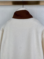 Cream fleece quarter-zip jacket back view with brown hood opening
