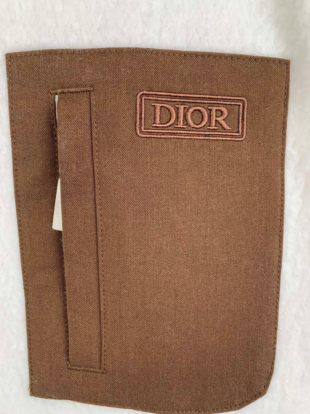 Brown Dior patch pocket on cream fleece quarter-zip jacket