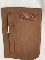 Brown Dior patch pocket on cream fleece quarter-zip jacket