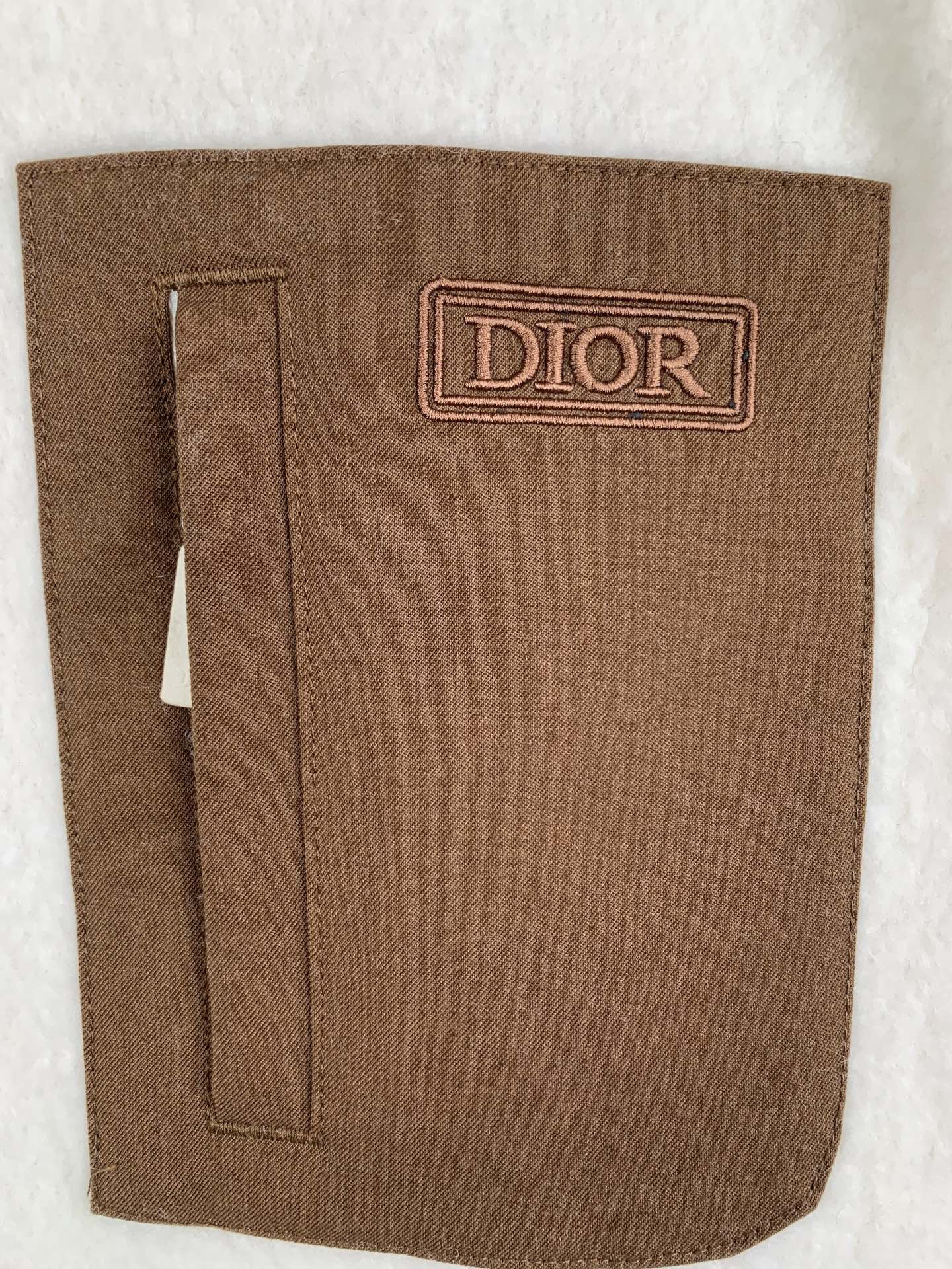 Brown Dior patch pocket on cream fleece quarter-zip jacket