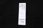 Dark hoodie with white size and care label on inner back neck