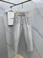 Light-wash denim jeans with belt loops and straight-leg fit
