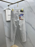 Versace light-gray denim jeans with front pocket panel featuring colorful baroque print