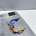 Light-wash jeans with colorful embroidered chest pocket panel