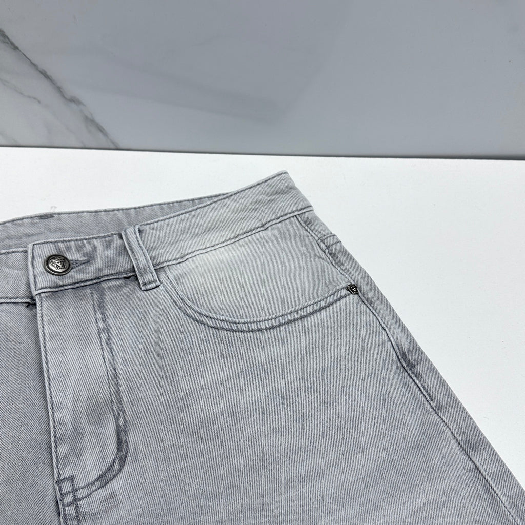 Light-wash jeans front with coin pocket and belt loop detail