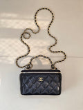 Chanel quilted mini bag in dark navy with gold chain strap and zipper top
