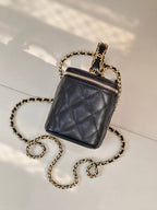 Chanel quilted mini bag in dark navy with gold chain strap and front zipper