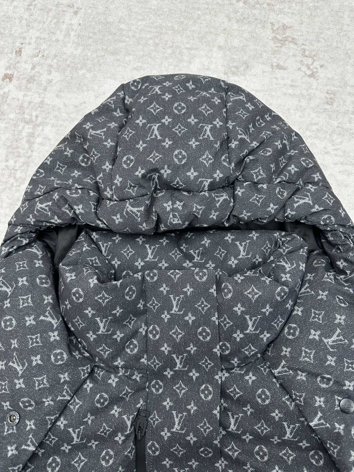 Louis Vuitton monogram puffer jacket hood, quilted puffer styling, dark gray.