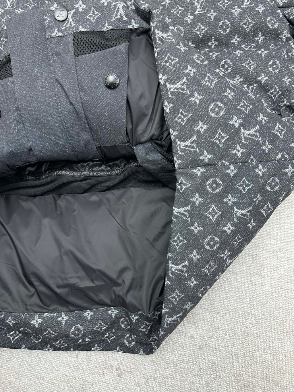 Louis Vuitton monogram puffer jacket interior lining with snap buttons, dark gray.