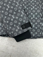 Louis Vuitton monogram puffer jacket sleeve cuff and hem, dark gray and black.