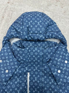 Blue hooded jacket with white Louis Vuitton monogram pattern, hood detail and inner pouch
