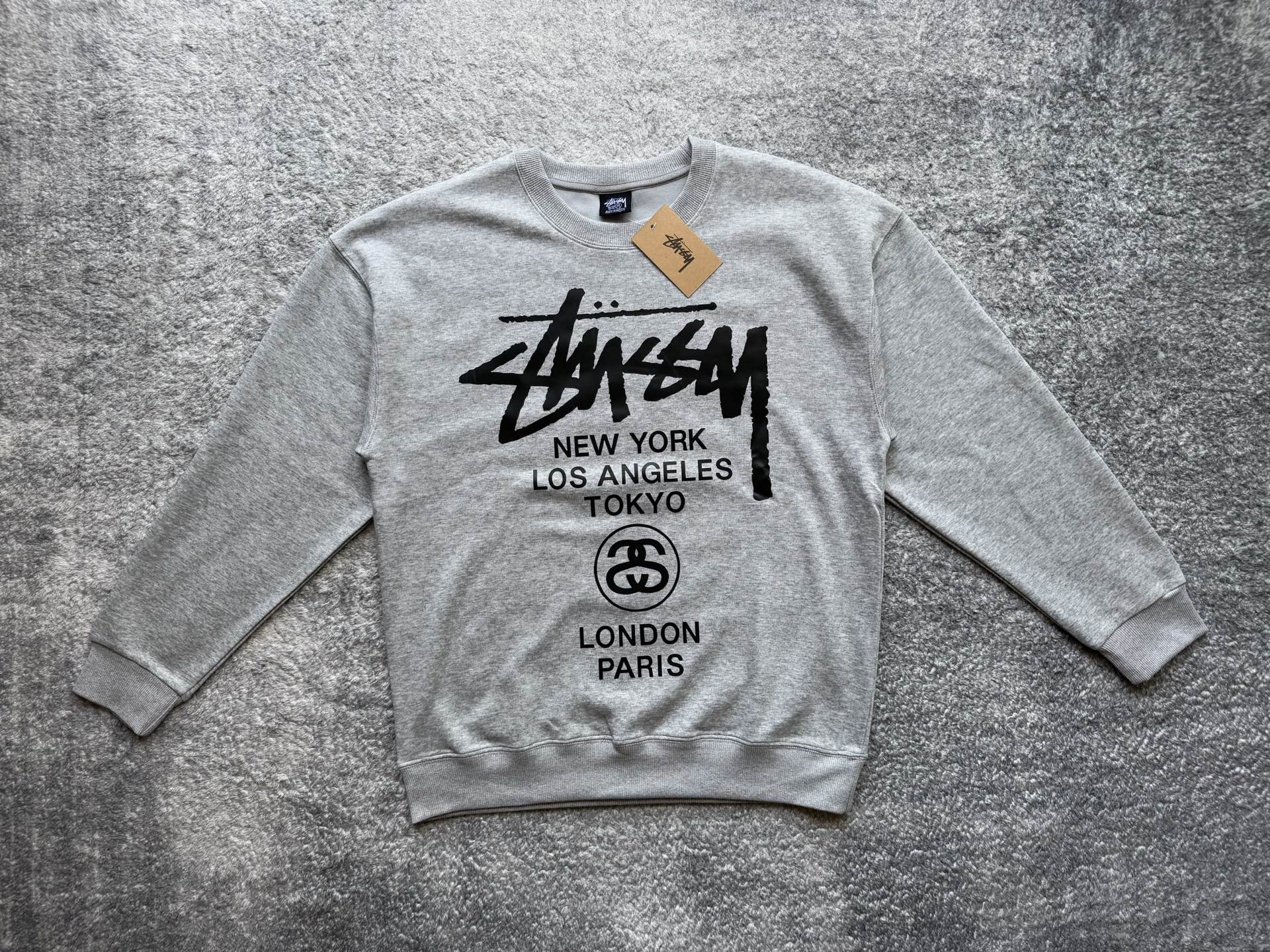 Stussy crewneck sweatshirt, light gray with white front city graphic