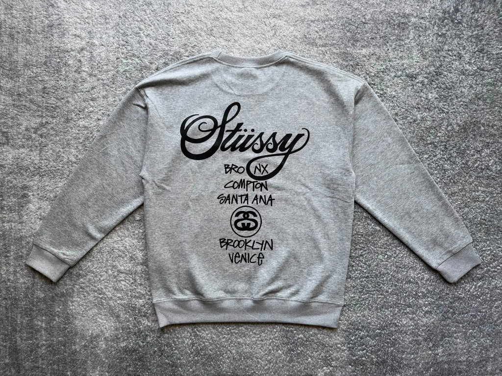 Stussy crewneck sweatshirt, light gray with white back logo and city text